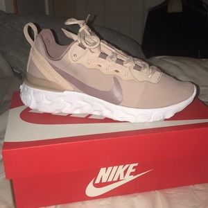 BRAND NEW, never worn NIKE sneakers